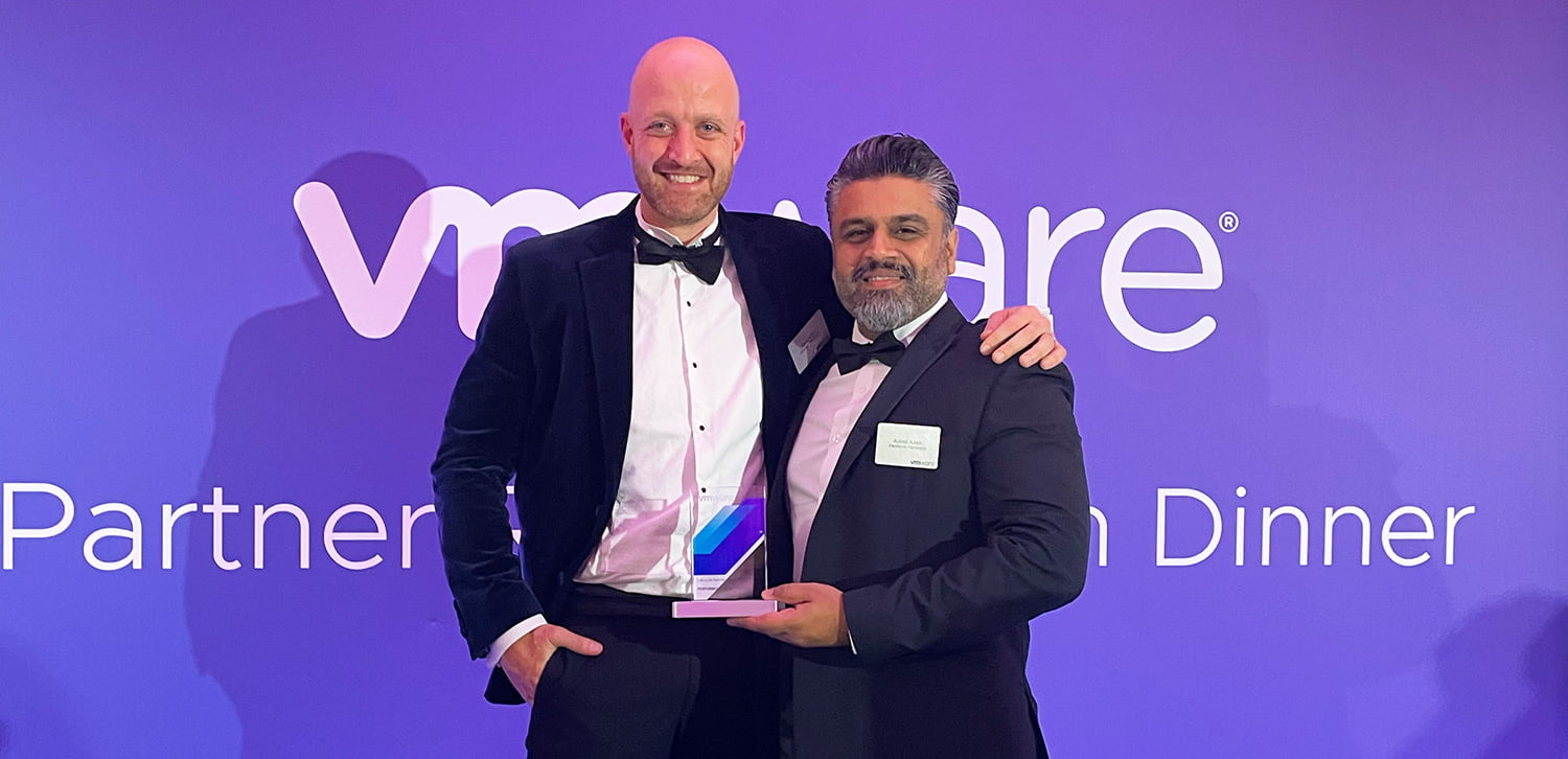 Adeel and shaun Accept Life Cycle Services award at VMware Award ceremony 2023